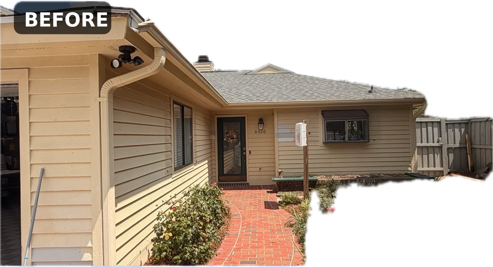 Wood privacy fence installation with gate on residential property rear yard
